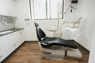 Dental examination chair in a clinical setting.